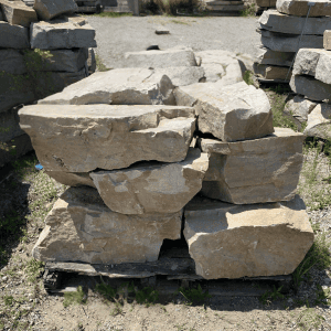 Stacked natural stone outcropping at Whispering Hills Nursery.